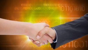 Composite image of close up of a handshake
