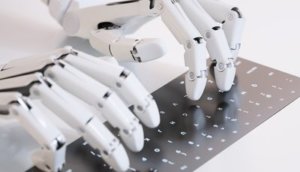 Robot typing on keyboard