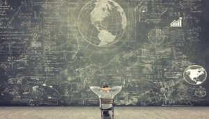 Businessman watching formulas