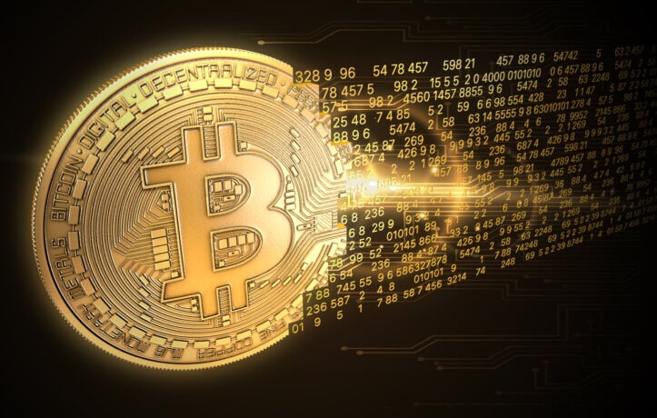 goldene bitcoin-münze, die sich in zahlen auflöst