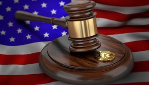 Bitcoin and judge gavel laying on flag of USA. Bitcoin legal situation in USA concept